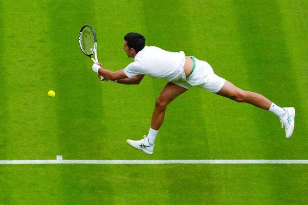 Mandatory Credit: Photo by Javier Garcia Shutterstock (13002017r) Novak Djokovic is beaten by a secnd-serve ace during his first round match Wimbledon Tennis Championships, Day 1, The All England Lawn Tennis and Croquet Club, London, UK - 27 Jun 2022 Wimbledon Tennis Championships, Day 1, The All England Lawn Tennis and Croquet Club, London, UK - 27 Jun 2022  Copyright: xJavierxGarcia Shutterstockx 13002017r