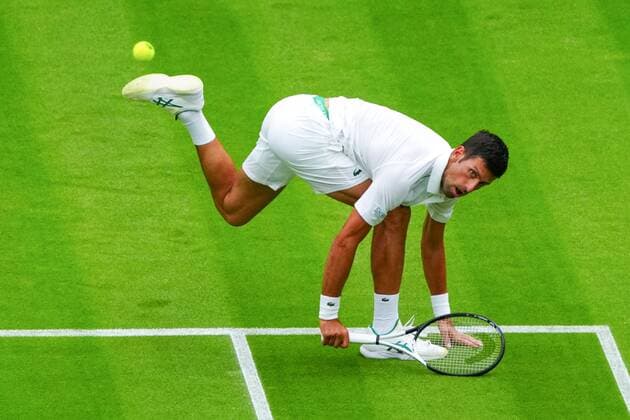 Mandatory Credit: Photo by Javier Garcia Shutterstock (13002017ak) Novak Djokovic during his first round match Wimbledon Tennis Championships, Day 1, The All England Lawn Tennis and Croquet Club, London, UK - 27 Jun 2022 Wimbledon Tennis Championships, Day 1, The All England Lawn Tennis and Croquet Club, London, UK - 27 Jun 2022  Copyright: xJavierxGarcia Shutterstockx 13002017ak