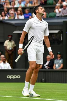 Mandatory Credit: Photo by James Veysey Shutterstock (13002284at) Novak Djokovic dejected during his first round match Wimbledon Tennis Championships, Day 2, The All England Lawn Tennis and Croquet Club, London, UK - 27 Jun 2022 Wimbledon Tennis Championships, Day 2, The All England Lawn Tennis and Croquet Club, London, UK - 27 Jun 2022  Copyright: xJamesxVeysey Shutterstockx 13002284at