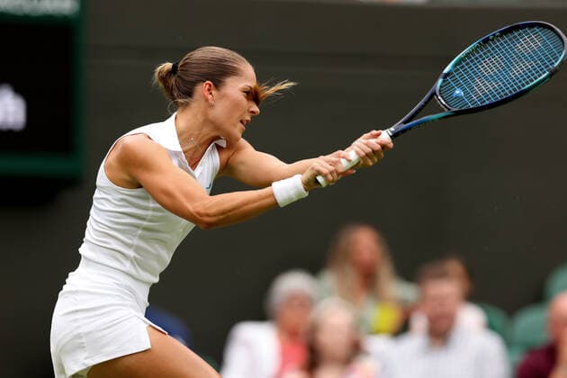27th June 2022, All England Lawn Tennis and Croquet Club, London, England; Wimbledon Tennis tournament; Mirjam Bjorklund plays a forehand to Ons Jabeur in the womens singles  ActionPlus12402586 ShaunxBrooks
