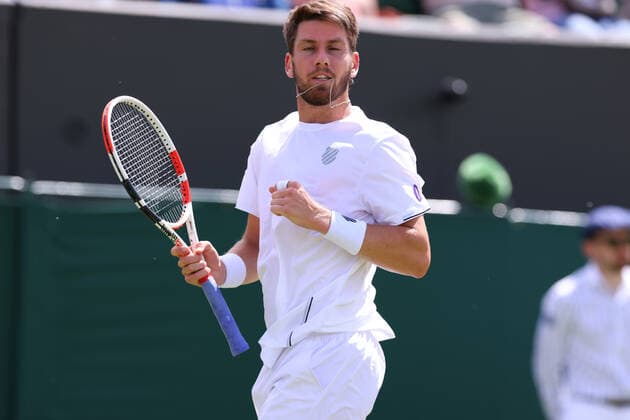 27th June 2022, All England Lawn Tennis and Croquet Club, London, England; Wimbledon Tennis tournament; Cameron Norrie celebrates a break of serve in the tie break against Pablo Andujar in the mens singles  ActionPlus12402572 ShaunxBrooks