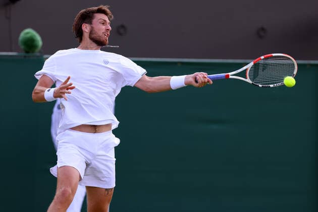 27th June 2022, All England Lawn Tennis and Croquet Club, London, England; Wimbledon Tennis tournament; Cameron Norrie plays a forehand to Pablo Andujar in the mens singles  ActionPlus12402575 ShaunxBrooks