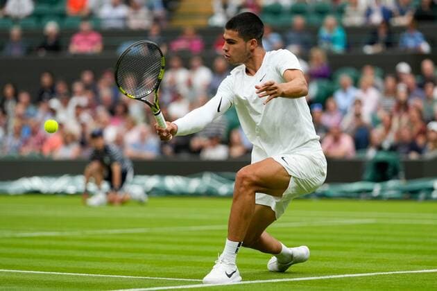 Mandatory Credit: Photo by Dave Shopland Shutterstock (13002015x) Carlos Alcaraz during his first round match Wimbledon Tennis Championships, Day 1, The All England Lawn Tennis and Croquet Club, London, UK - 27 Jun 2022 Wimbledon Tennis Championships, Day 1, The All England Lawn Tennis and Croquet Club, London, UK - 27 Jun 2022  Copyright: xDavexShopland Shutterstockx 13002015x