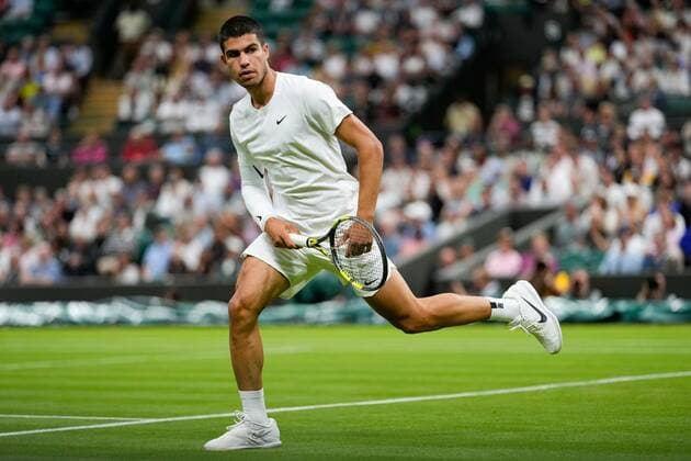 Mandatory Credit: Photo by Dave Shopland Shutterstock (13002015ag) Carlos Alcaraz during his first round match Wimbledon Tennis Championships, Day 1, The All England Lawn Tennis and Croquet Club, London, UK - 27 Jun 2022 Wimbledon Tennis Championships, Day 1, The All England Lawn Tennis and Croquet Club, London, UK - 27 Jun 2022  Copyright: xDavexShopland Shutterstockx 13002015ag