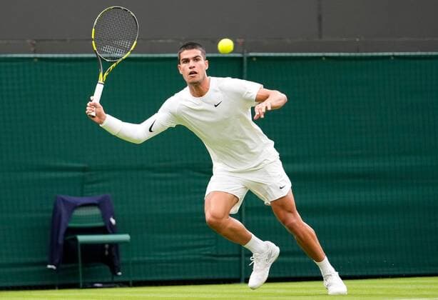 Mandatory Credit: Photo by Dave Shopland Shutterstock (13002015am) Carlos Alcaraz during his first round match Wimbledon Tennis Championships, Day 1, The All England Lawn Tennis and Croquet Club, London, UK - 27 Jun 2022 Wimbledon Tennis Championships, Day 1, The All England Lawn Tennis and Croquet Club, London, UK - 27 Jun 2022  Copyright: xDavexShopland Shutterstockx 13002015am