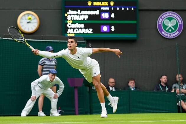 Mandatory Credit: Photo by Dave Shopland Shutterstock (13002015ai) Carlos Alcaraz during his first round match Wimbledon Tennis Championships, Day 1, The All England Lawn Tennis and Croquet Club, London, UK - 27 Jun 2022 Wimbledon Tennis Championships, Day 1, The All England Lawn Tennis and Croquet Club, London, UK - 27 Jun 2022  Copyright: xDavexShopland Shutterstockx 13002015ai
