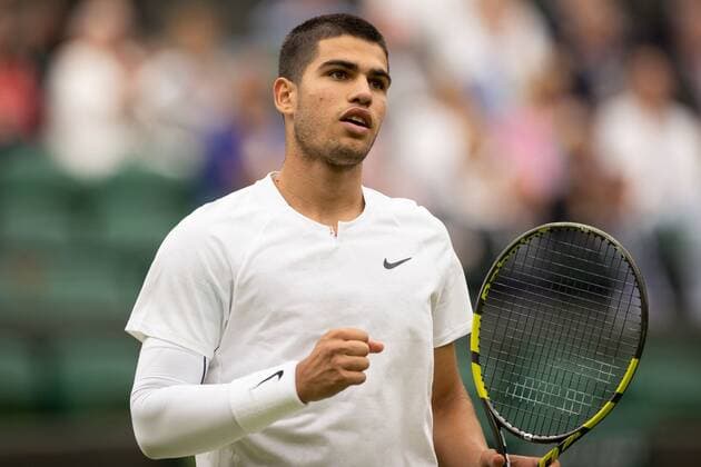 Mandatory Credit: Photo by Ella Ling Shutterstock (13002016ab) Carlos Alcaraz during his first round match Wimbledon Tennis Championships, Day 1, The All England Lawn Tennis and Croquet Club, London, UK - 27 Jun 2022 Wimbledon Tennis Championships, Day 1, The All England Lawn Tennis and Croquet Club, London, UK - 27 Jun 2022  Copyright: xEllaxLing Shutterstockx 13002016ab