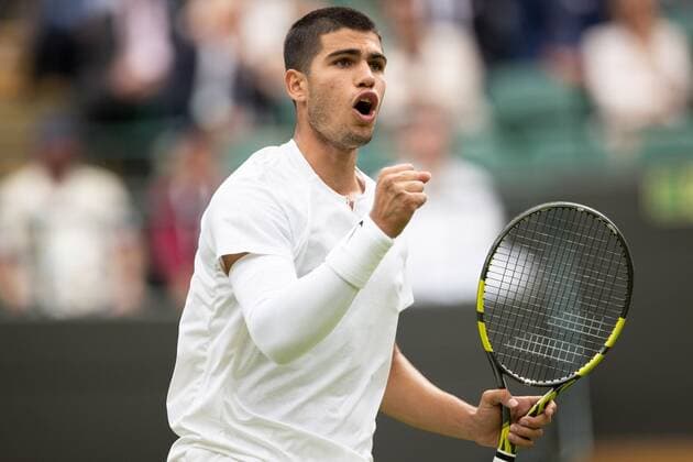 Mandatory Credit: Photo by Ella Ling Shutterstock (13002016as) Carlos Alcaraz during his first round match Wimbledon Tennis Championships, Day 1, The All England Lawn Tennis and Croquet Club, London, UK - 27 Jun 2022 Wimbledon Tennis Championships, Day 1, The All England Lawn Tennis and Croquet Club, London, UK - 27 Jun 2022  Copyright: xEllaxLing Shutterstockx 13002016as