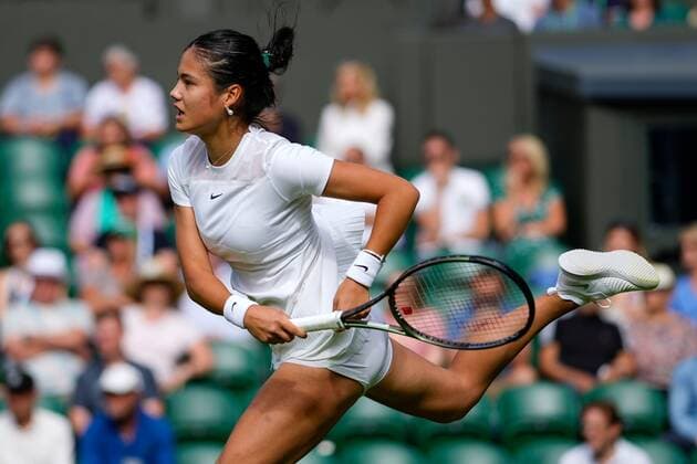 Mandatory Credit: Photo by Dave Shopland Shutterstock (13002015bb) Emma Raducanu during her first round match Wimbledon Tennis Championships, Day 1, The All England Lawn Tennis and Croquet Club, London, UK - 27 Jun 2022 Wimbledon Tennis Championships, Day 1, The All England Lawn Tennis and Croquet Club, London, UK - 27 Jun 2022  Copyright: xDavexShopland Shutterstockx 13002015bb
