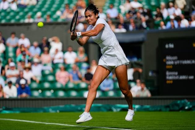 Mandatory Credit: Photo by Dave Shopland Shutterstock (13002015bh) Emma Raducanu during her first round match Wimbledon Tennis Championships, Day 1, The All England Lawn Tennis and Croquet Club, London, UK - 27 Jun 2022 Wimbledon Tennis Championships, Day 1, The All England Lawn Tennis and Croquet Club, London, UK - 27 Jun 2022  Copyright: xDavexShopland Shutterstockx 13002015bh