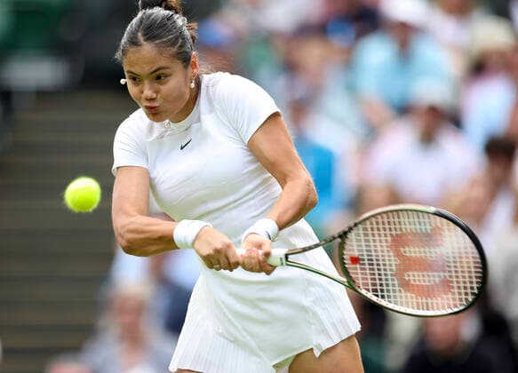 (220628) -- LONDON, June 28, 2022 -- Emma Raducanu competes during the women s singles first round match between Emma Raducanu of Britain and Alison Van Uytvanck of Belgium at Wimbledon tennis championship in London, Britain, on June 27, 2022. ) (SP)BRITAIN-LONDON-TENNIS-WIMBLEDON-DAY 1 HanxYan 
