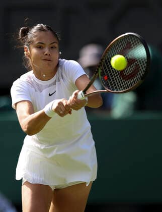 (220628) -- LONDON, June 28, 2022 -- Emma Raducanu competes during the women s singles first round match between Emma Raducanu of Britain and Alison Van Uytvanck of Belgium at Wimbledon tennis championship in London, Britain, on June 27, 2022. ) (SP)BRITAIN-LONDON-TENNIS-WIMBLEDON-DAY 1 HanxYan 