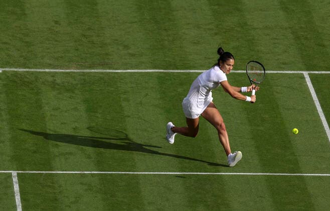 (220628) -- LONDON, June 28, 2022 -- Emma Raducanu competes during the women s singles first round match between Emma Raducanu of Britain and Alison Van Uytvanck of Belgium at Wimbledon tennis championship in London, Britain, on June 27, 2022. ) (SP)BRITAIN-LONDON-TENNIS-WIMBLEDON-DAY 1 HanxYan 