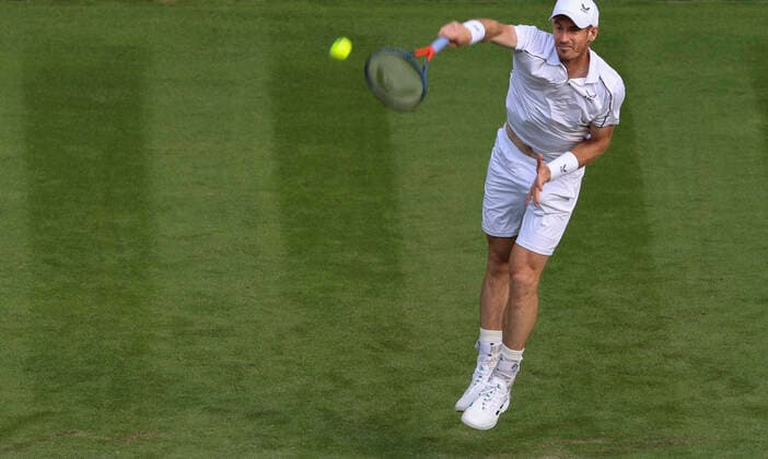 (220628) -- LONDON, June 28, 2022 -- Andy Murray serves during the men s singles first round match between Andy Murray of Britain and James Duckworth of Australia at Wimbledon Tennis Championship in London, Britain, on June 27, 2022. ) (SP)BRITAIN-LONDON-TENNIS-WIMBLEDON-DAY 1 HanxYan 