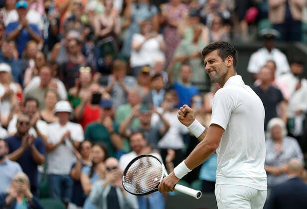 (220628) -- LONDON, June 28, 2022 -- Novak Djokovic celebrates after winning the men s singles first round match between Novak Djokovic of Serbia and Kwon Soonwoo of South Korea at Wimbledon Tennis Championship in London, Britain, on June 27, 2022. ) (SP)BRITAIN-LONDON-TENNIS-WIMBLEDON-DAY 1 HanxYan 