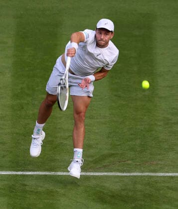 (220628) -- LONDON, June 28, 2022 -- James Duckworth serves during the men s singles first round match between Andy Murray of Britain and James Duckworth of Australia at Wimbledon Tennis Championship in London, Britain, on June 27, 2022. ) (SP)BRITAIN-LONDON-TENNIS-WIMBLEDON-DAY 1 HanxYan 