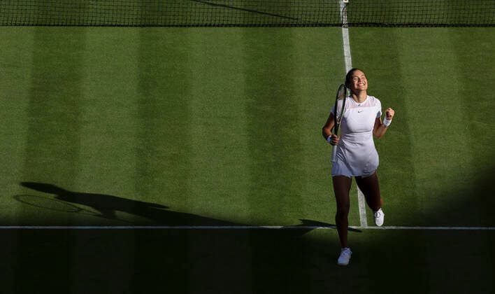(220628) -- LONDON, June 28, 2022 -- Emma Raducanu celebrates after winning the women s singles first round match between Emma Raducanu of Britain and Alison Van Uytvanck of Belgium at Wimbledon tennis championship in London, Britain, on June 27, 2022. ) (SP)BRITAIN-LONDON-TENNIS-WIMBLEDON-DAY 1 HanxYan 