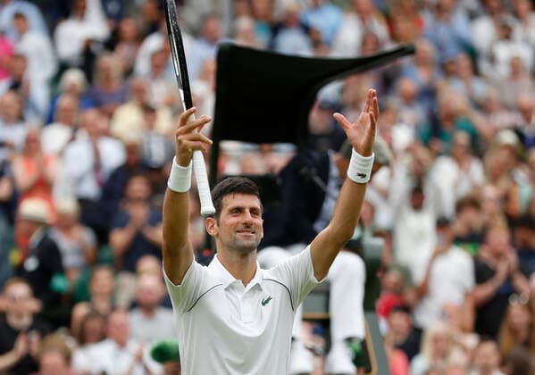 (220628) -- LONDON, June 28, 2022 -- Novak Djokovic celebrates after winning the men s singles first round match between Novak Djokovic of Serbia and Kwon Soonwoo of South Korea at Wimbledon Tennis Championship in London, Britain, on June 27, 2022. ) (SP)BRITAIN-LONDON-TENNIS-WIMBLEDON-DAY 1 HanxYan 