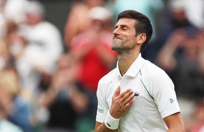 (220628) -- LONDON, June 28, 2022 -- Novak Djokovic celebrates after winning the men s singles first round match between Novak Djokovic of Serbia and Kwon Soonwoo of South Korea at Wimbledon Tennis Championship in London, Britain, on June 27, 2022. ) (SP)BRITAIN-LONDON-TENNIS-WIMBLEDON-DAY 1 LixYing 