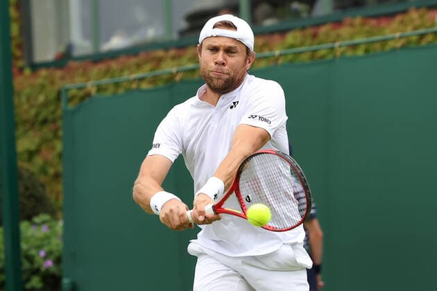 28th June 2022, All England Lawn Tennis and Croquet Club, London, England; Wimbledon Tennis tournament; Radu Albot plays a backhand to David Goffin  ActionPlus12402692 ShaunxBrooks