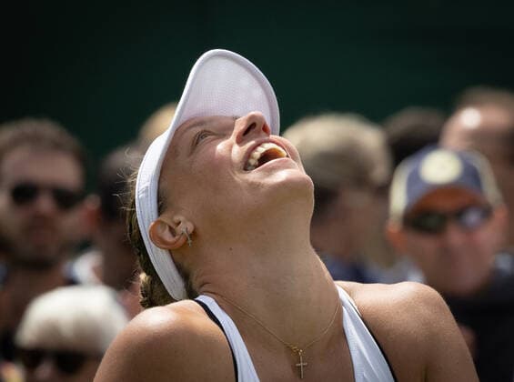 Belgian Yanina Wickmayer celebrates winning a first round game in the women s singles tournament against Chinese Zhu at the 2022 Wimbledon grand slam tennis tournament at the All England Tennis Club, in south-west London, Britain, Tuesday 28 June 2022. BENOITxDOPPAGNE  x36715614x