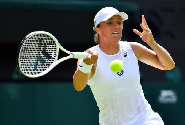 Mandatory Credit: Photo by James Veysey Shutterstock (13002287ab) Iga Swiatek during her first round match Wimbledon Tennis Championships, Day 2, The All England Lawn Tennis and Croquet Club, London, UK - 28 Jun 2022 Wimbledon Tennis Championships, Day 2, The All England Lawn Tennis and Croquet Club, London, UK - 28 Jun 2022  Copyright: xJamesxVeysey Shutterstockx 13002287ab