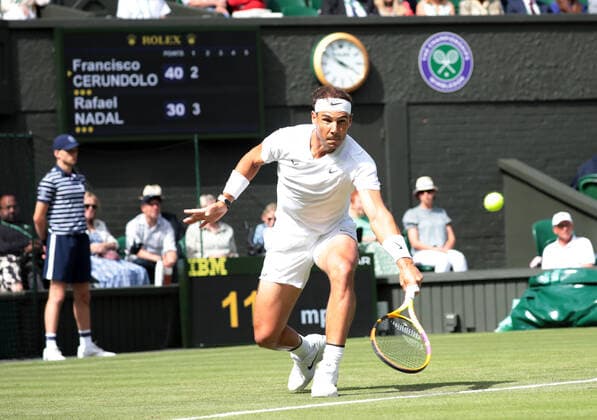 Spain s Rafael Nadal in action in his first round match against Argentinian Francisco Cerundolo on day two of the 2022 Wimbledon championships in London on June 28, 2022.  LON2022062845 HUGOxPHILPOTT