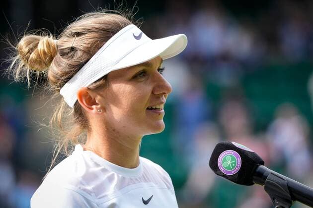 Mandatory Credit: Photo by Dave Shopland Shutterstock (13002019ck) Simona Halep is interviewed after winning her first round match Wimbledon Tennis Championships, Day 2, The All England Lawn Tennis and Croquet Club, London, UK - 28 Jun 2022 Wimbledon Tennis Championships, Day 2, The All England Lawn Tennis and Croquet Club, London, UK - 28 Jun 2022  Copyright: xDavexShopland Shutterstockx 13002019ck
