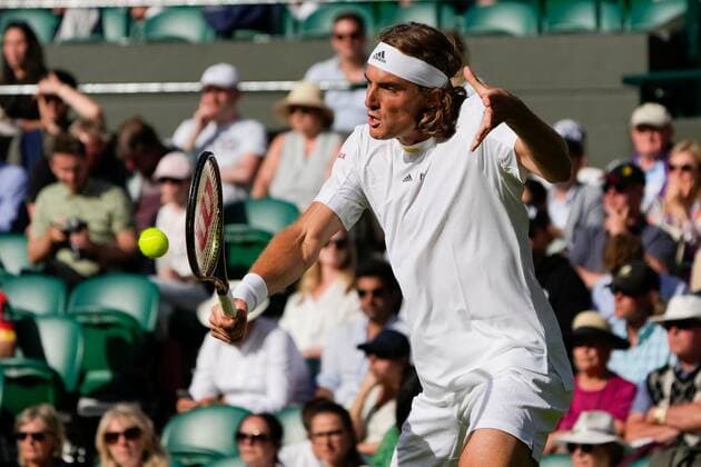 Mandatory Credit: Photo by Dave Shopland Shutterstock (13002019db) Stefanos Tsitsipas during his first round match Wimbledon Tennis Championships, Day 2, The All England Lawn Tennis and Croquet Club, London, UK - 28 Jun 2022 Wimbledon Tennis Championships, Day 2, The All England Lawn Tennis and Croquet Club, London, UK - 28 Jun 2022  Copyright: xDavexShopland Shutterstockx 13002019db