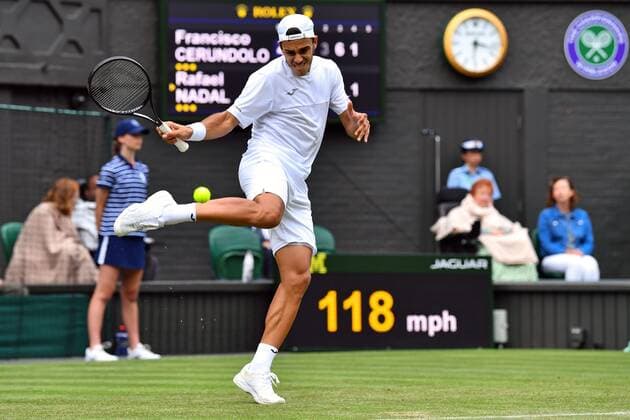 Mandatory Credit: Photo by James Veysey Shutterstock (13002287dp) Francisco Cerundolo kicks the tennis ball during his first round match Wimbledon Tennis Championships, Day 2, The All England Lawn Tennis and Croquet Club, London, UK - 28 Jun 2022 Wimbledon Tennis Championships, Day 2, The All England Lawn Tennis and Croquet Club, London, UK - 28 Jun 2022  Copyright: xJamesxVeysey Shutterstockx 13002287dp