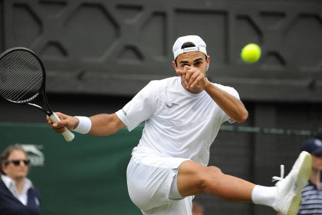 Tennis - 2022 Wimbledon Championships - Week One - Day Two (Tuesday) - All England Lawn Tennis Club, Wimbledon - Tuesday 28th June 2022 Rafa Nadal v Francisco Cerundolo Francisco Cerundolo kicks the tennis ball in frustration 