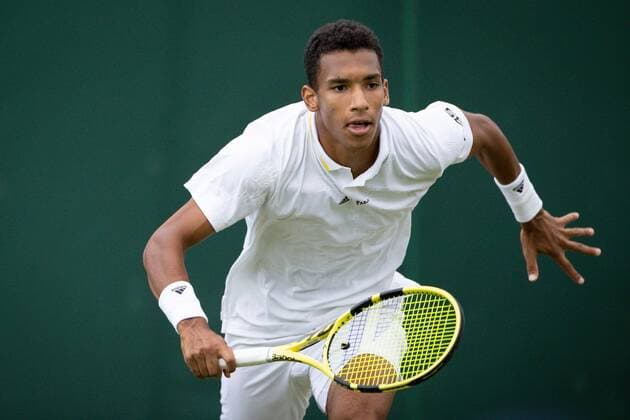 Mandatory Credit: Photo by Ella Ling Shutterstock (13002020dp) Felix Auger-Aliassime during his first round match Wimbledon Tennis Championships, Day 2, The All England Lawn Tennis and Croquet Club, London, UK - 28 Jun 2022 Wimbledon Tennis Championships, Day 2, The All England Lawn Tennis and Croquet Club, London, UK - 28 Jun 2022  Copyright: xEllaxLing Shutterstockx 13002020dp