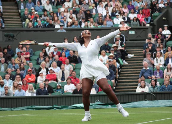 American Serena Williams in action in her first round match against France s Harmony Tan on day two of the 2022 Wimbledon championships in London on Tuesday, June 28, 2022.  LON2022062863 HUGOxPHILPOTT