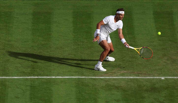 (220629) -- LONDON, June 29, 2022 -- Rafael Nadal hits a return during the men s singles first round match between Rafael Nadal of Spain and Francisco Cerundolo of Argentina at Wimbledon Tennis Championship in London, Britain, on June 28, 2022. ) (SP)BRITAIN-LONDON-TENNIS-WIMBLEDON-DAY 2 HanxYan 