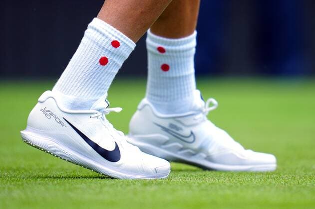 Sport Bilder des Tages Mandatory Credit: Photo by Javier Garcia Shutterstock (13008249o) The socks and Nike tennis shoes of Thanasi Kokkinakis Wimbledon Tennis Championships, Day 3, The All England Lawn Tennis and Croquet Club, London, UK - 29 Jun 2022 Wimbledon Tennis Championships, Day 3, The All England Lawn Tennis and Croquet Club, London, UK - 29 Jun 2022  Copyright: xJavierxGarcia Shutterstockx 13008249o
