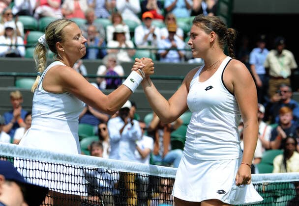 Tennis - 2022 Wimbledon Championships - Week One - Day Two (Wednesday) - All England Lawn Tennis Club, Wimbledon - Wednesday 29th June 2022 Jule Niemeier v Anett Kontaveit Jule Niemeier of Germany with Kontaveit after the match 