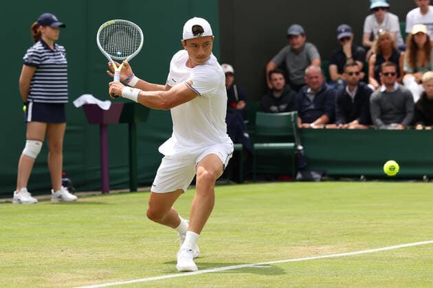29th June 2022, All England Lawn Tennis and Croquet Club, London, England; Wimbledon Tennis tournament; Ryan Peniston plays a backhand to Steve Johnson  ActionPlus12402849 ShaunxBrooks