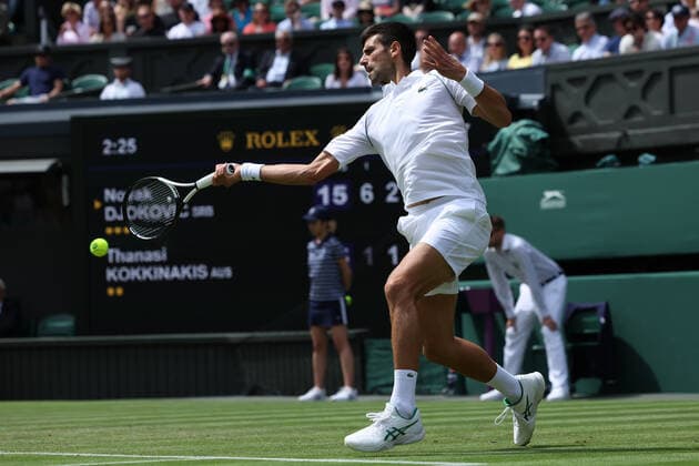 29th June 2022, All England Lawn Tennis and Croquet Club, London, England; Wimbledon Tennis tournament; Novak Djokovic plays a forehand to Thanasi Kokkinakis in the mens singles  ActionPlus12402879 ShaunxBrooks