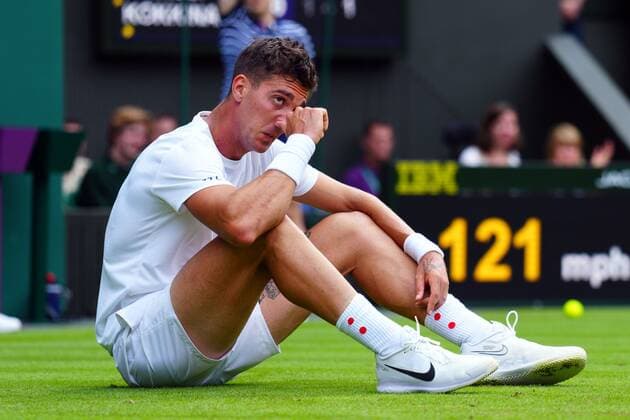 Mandatory Credit: Photo by Javier Garcia Shutterstock (13008249bf) Thanasi Kokkinakis during his second round match Wimbledon Tennis Championships, Day 3, The All England Lawn Tennis and Croquet Club, London, UK - 29 Jun 2022 Wimbledon Tennis Championships, Day 3, The All England Lawn Tennis and Croquet Club, London, UK - 29 Jun 2022  Copyright: xJavierxGarcia Shutterstockx 13008249bf
