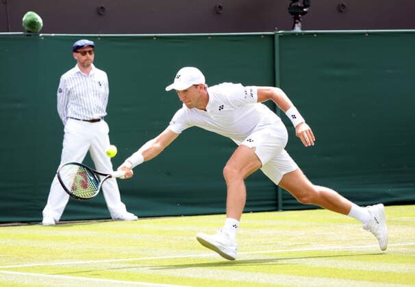 Norwegian Casper Ruud in action against France s Ugo Humbert on day three of the 2022 Wimbledon championships in London on Wednesday, June 29, 2022.  LON2022062914 HUGOxPHILPOTT