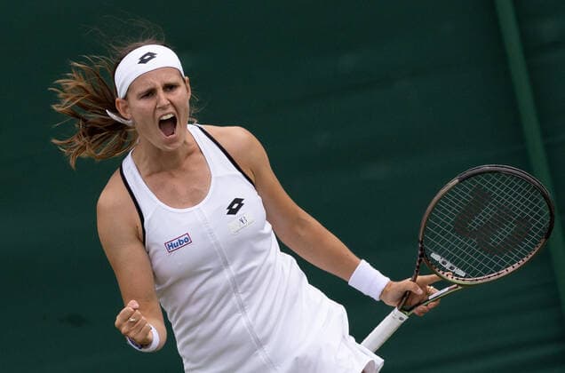 Belgian Greet Minnen celebrates after winning a tennis match against Spanish Muguruza in the first round of the women s singles tournament at the 2022 Wimbledon grand slam tennis tournament at the All England Tennis Club, in south-west London, Britain, Wednesday 29 June 2022. The game strated yesterday with the Minnen winning 6-4 the first set. BENOITxDOPPAGNE  x36802246x