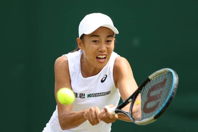 (220629) -- LONDON, June 29, 2022 -- Zhang Shuai of China hits a return during the women s singles 2nd round match against Marta Kostyuk of Ukraine at Wimbledon Tennis Championship in London, Britain, June 29, 2022. ) (SP)BRITAIN-LONDON-TENNIS-WIMBLEDON-DAY 2 LixYing 