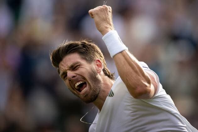 Mandatory Credit: Photo by Ella Ling Shutterstock (13008247dm) Cameron Norrie celebrates after winning his second round match Wimbledon Tennis Championships, Day 3, The All England Lawn Tennis and Croquet Club, London, UK - 29 Jun 2022 Wimbledon Tennis Championships, Day 3, The All England Lawn Tennis and Croquet Club, London, UK - 29 Jun 2022  Copyright: xEllaxLing Shutterstockx 13008247dm
