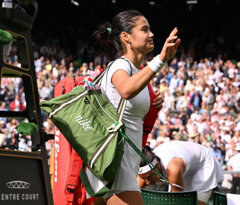 Tennis - 2022 Wimbledon Championships - Week One - Day Two (Wednesday) - All England Lawn Tennis Club, Wimbledon - Wednesday 29th June 2022 Caroline Garcia v Emma Raducanu A dejected Emma Raducanu of Great Britain leaves centre court after defeat 