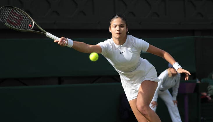 Great Britain s Emma Raducanu in action against French Caroline Garcia on day three of the 2022 Wimbledon championships in London on Wednesday, June 29,2022. Garcia won the match 6-3,6-3.  LON2022062950 HUGOxPHILPOTT