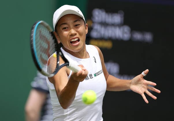 (220629) -- LONDON, June 29, 2022 -- Zhang Shuai of China returns the shot during the women s singles 2nd round match against Marta Kostyuk of Ukraine at Wimbledon Tennis Championship in London, Britain, June 29, 2022. ) (SP)BRITAIN-LONDON-TENNIS-WIMBLEDON LixYing 
