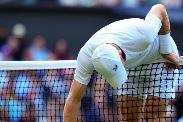 Mandatory Credit: Photo by Javier Garcia Shutterstock (13008249iz) Andy Murray runs into the net during his second round match Wimbledon Tennis Championships, Day 3, The All England Lawn Tennis and Croquet Club, London, UK - 29 Jun 2022 Wimbledon Tennis Championships, Day 3, The All England Lawn Tennis and Croquet Club, London, UK - 29 Jun 2022  Copyright: xJavierxGarcia Shutterstockx 13008249iz