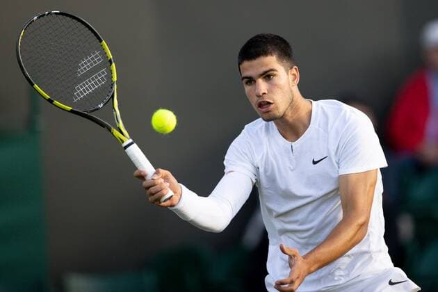 Mandatory Credit: Photo by Ella Ling Shutterstock (13008247dt) Carlos Alcaraz during his second round match Wimbledon Tennis Championships, Day 3, The All England Lawn Tennis and Croquet Club, London, UK - 29 Jun 2022 Wimbledon Tennis Championships, Day 3, The All England Lawn Tennis and Croquet Club, London, UK - 29 Jun 2022  Copyright: xEllaxLing Shutterstockx 13008247dt