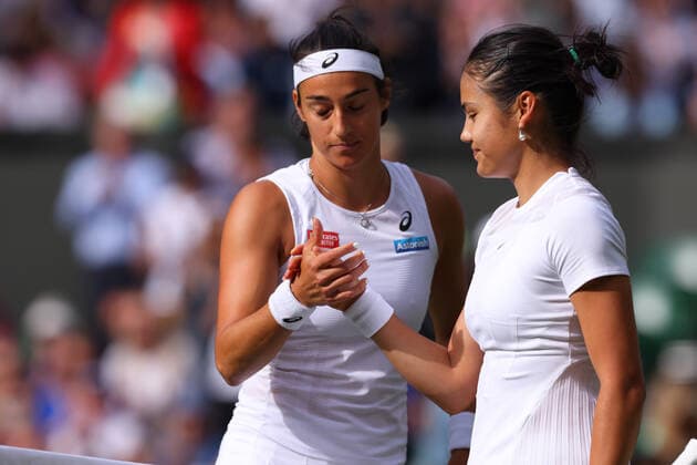 29th June 2022, All England Lawn Tennis and Croquet Club, London, England; Wimbledon Tennis tournament; Caroline Garcia shakes hands with Emma Raducanu after he win in the ladies singles  ActionPlus12402949 ShaunxBrooks