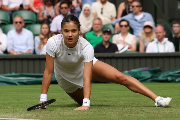 29th June 2022, All England Lawn Tennis and Croquet Club, London, England; Wimbledon Tennis tournament; Emma Raducanu slips during her match with Caroline Garcia in the ladies singles  ActionPlus12402912 ShaunxBrooks